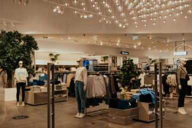 A store filled with lots of clothes and furniture